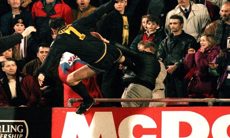 Crystal Palace v Manchester United 25/1/95 F.A Premier League  Mandatory Credit : Action Images   Man Utd's Eric Cantona jumps into the crowd with his infamous Kung-Fu kick on a Palace supporter after being sent-off